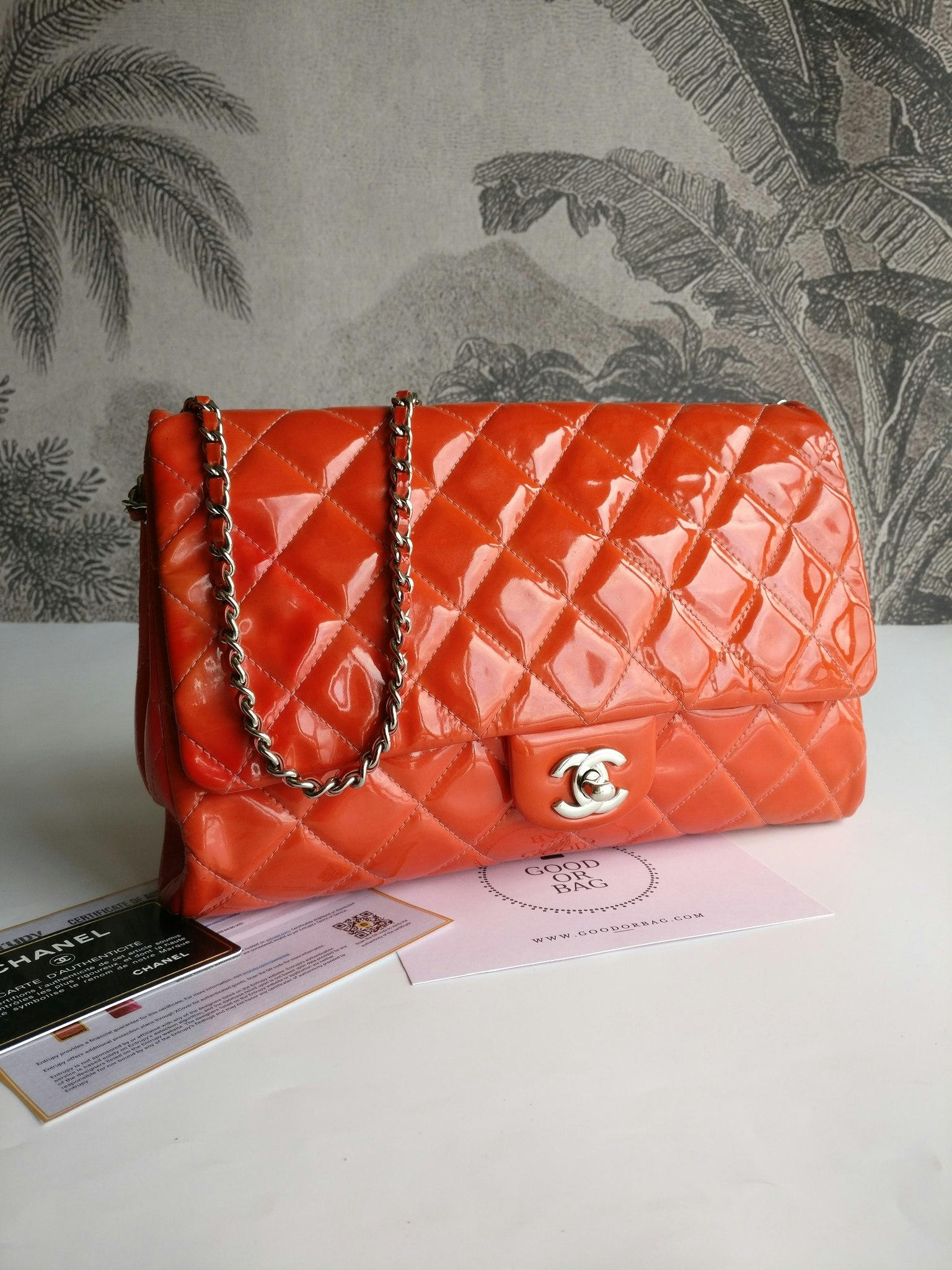 Chanel quilted red patent flap bag
