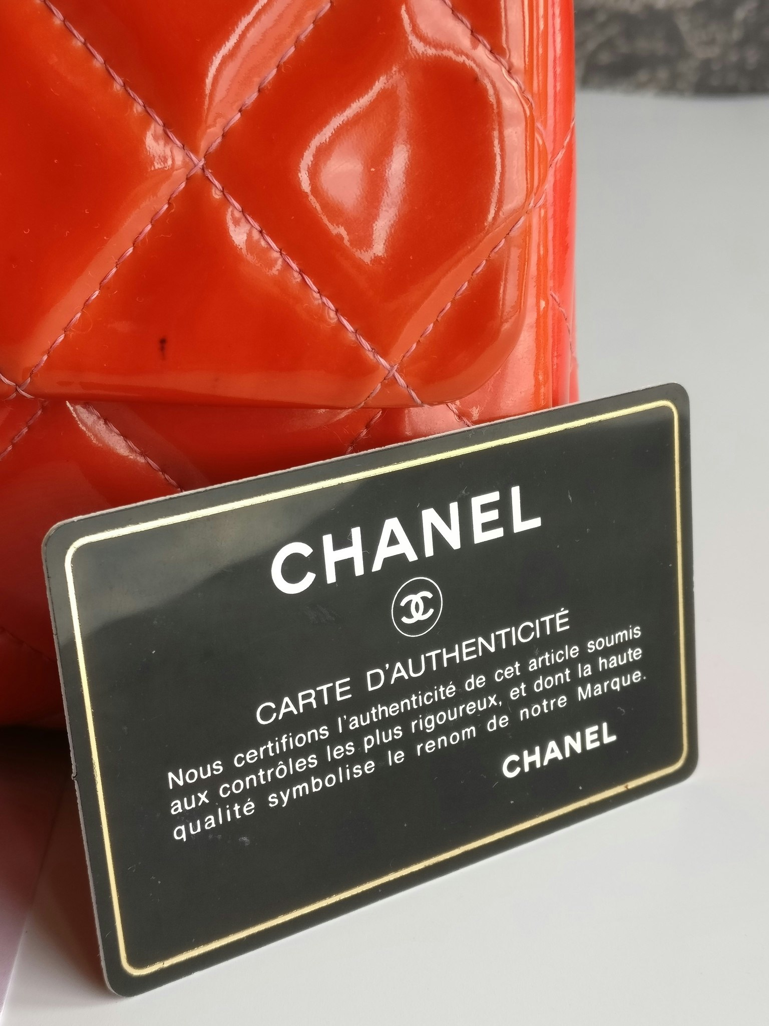 Chanel quilted red patent flap bag