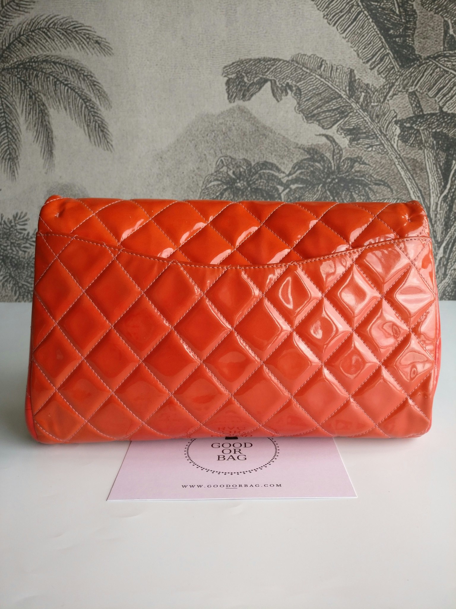 Chanel quilted red patent flap bag