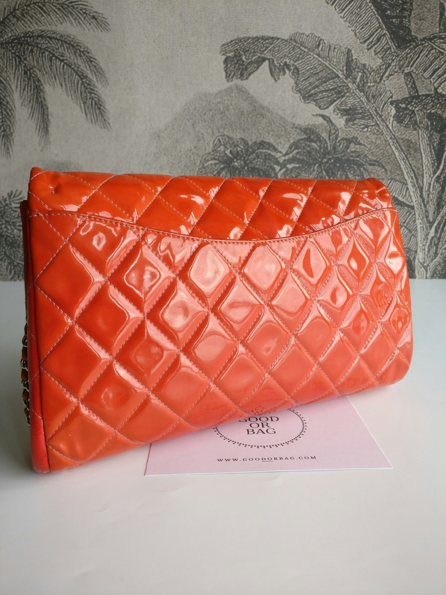 Chanel quilted red patent flap bag