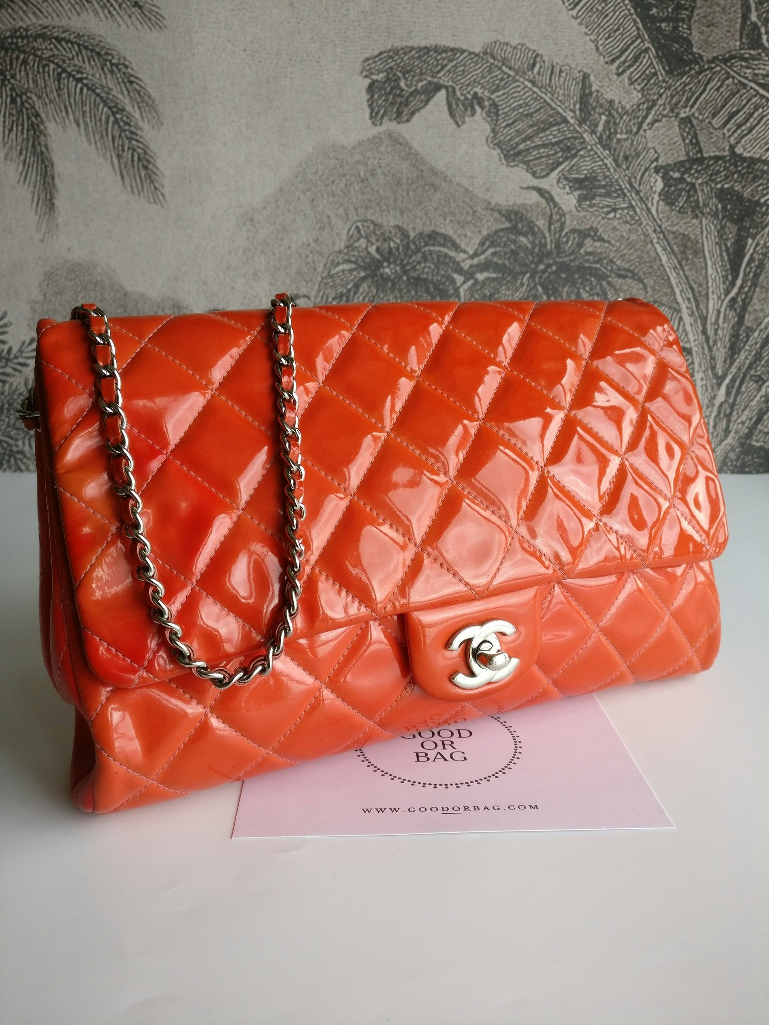 Chanel quilted red patent flap bag