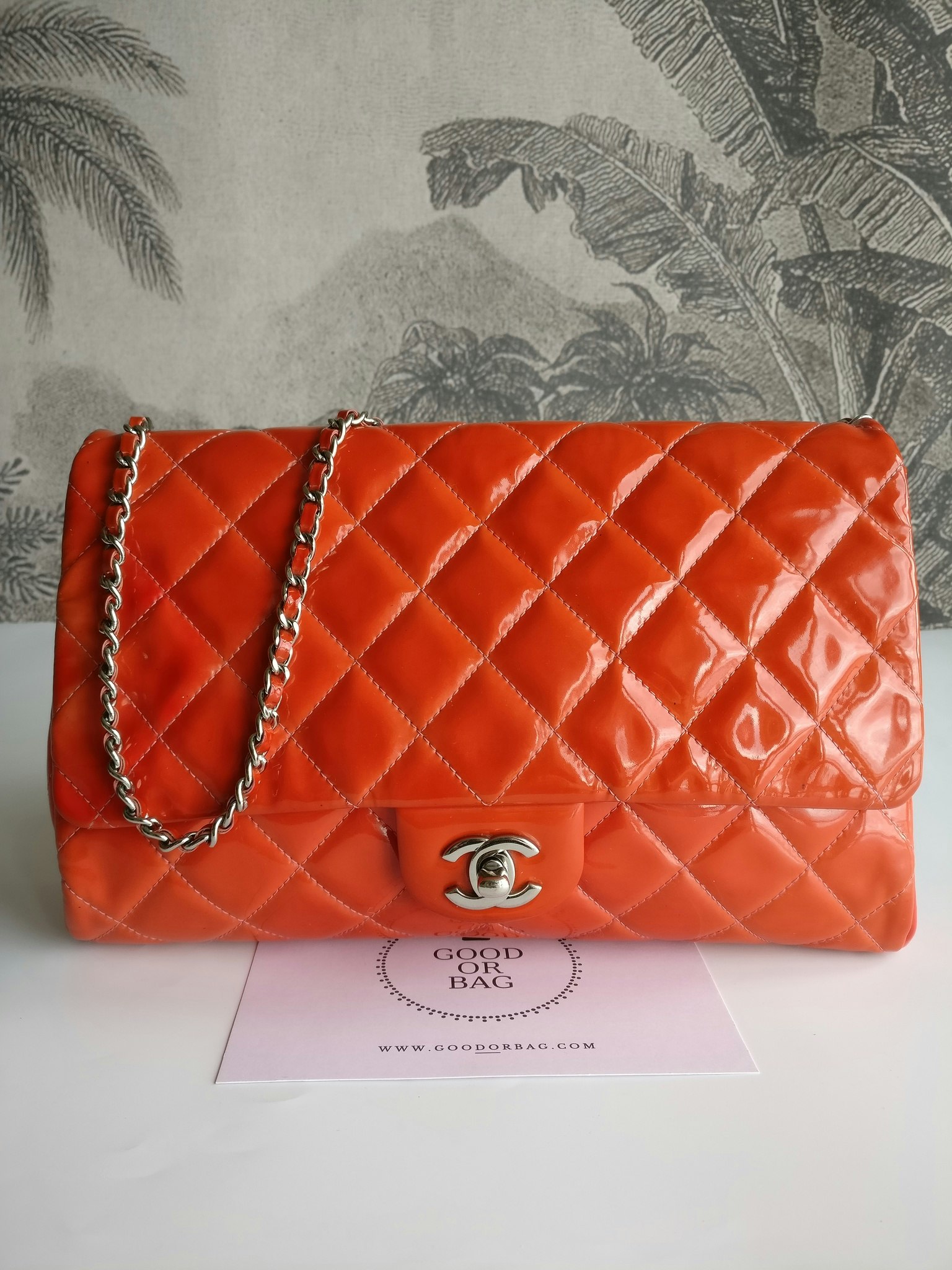 Chanel quilted red patent flap bag