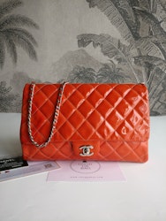 Chanel quilted red patent flap bag