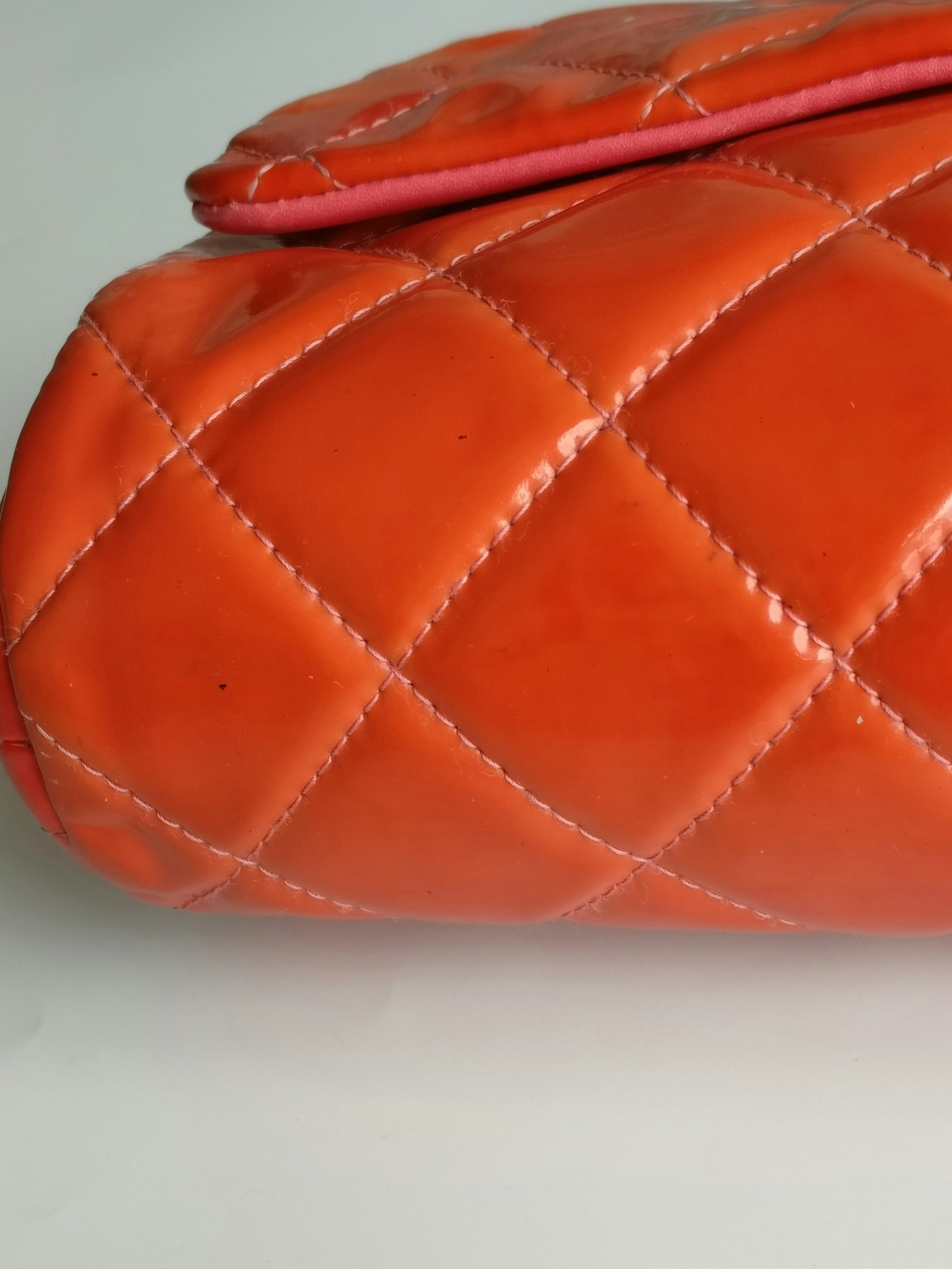 Chanel quilted red patent flap bag