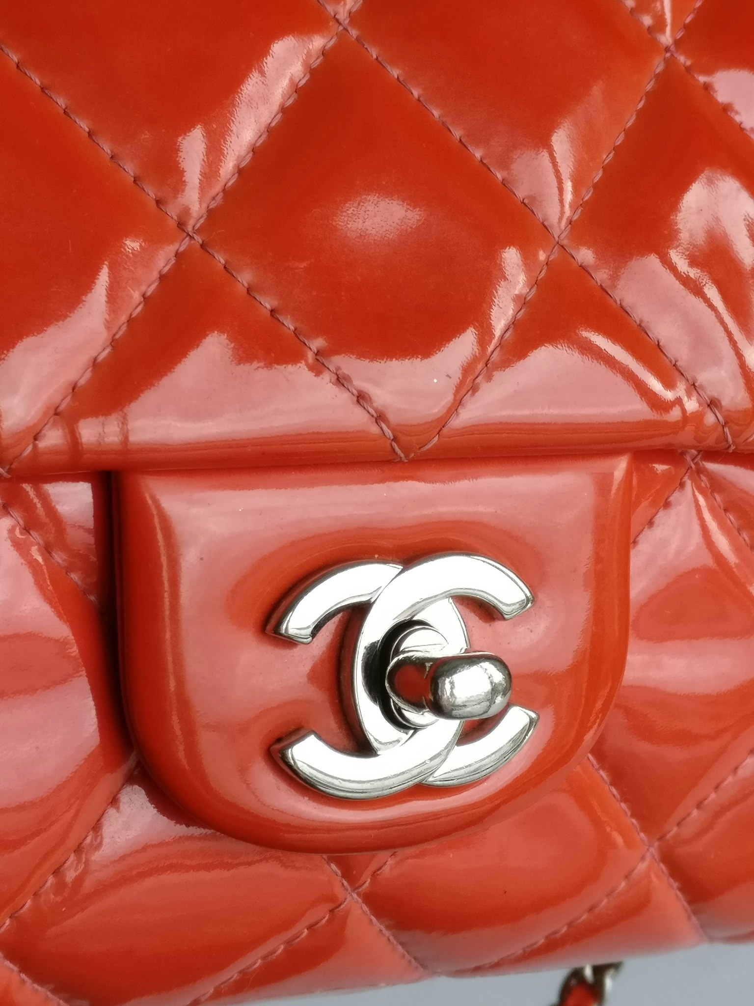Chanel quilted red patent flap bag