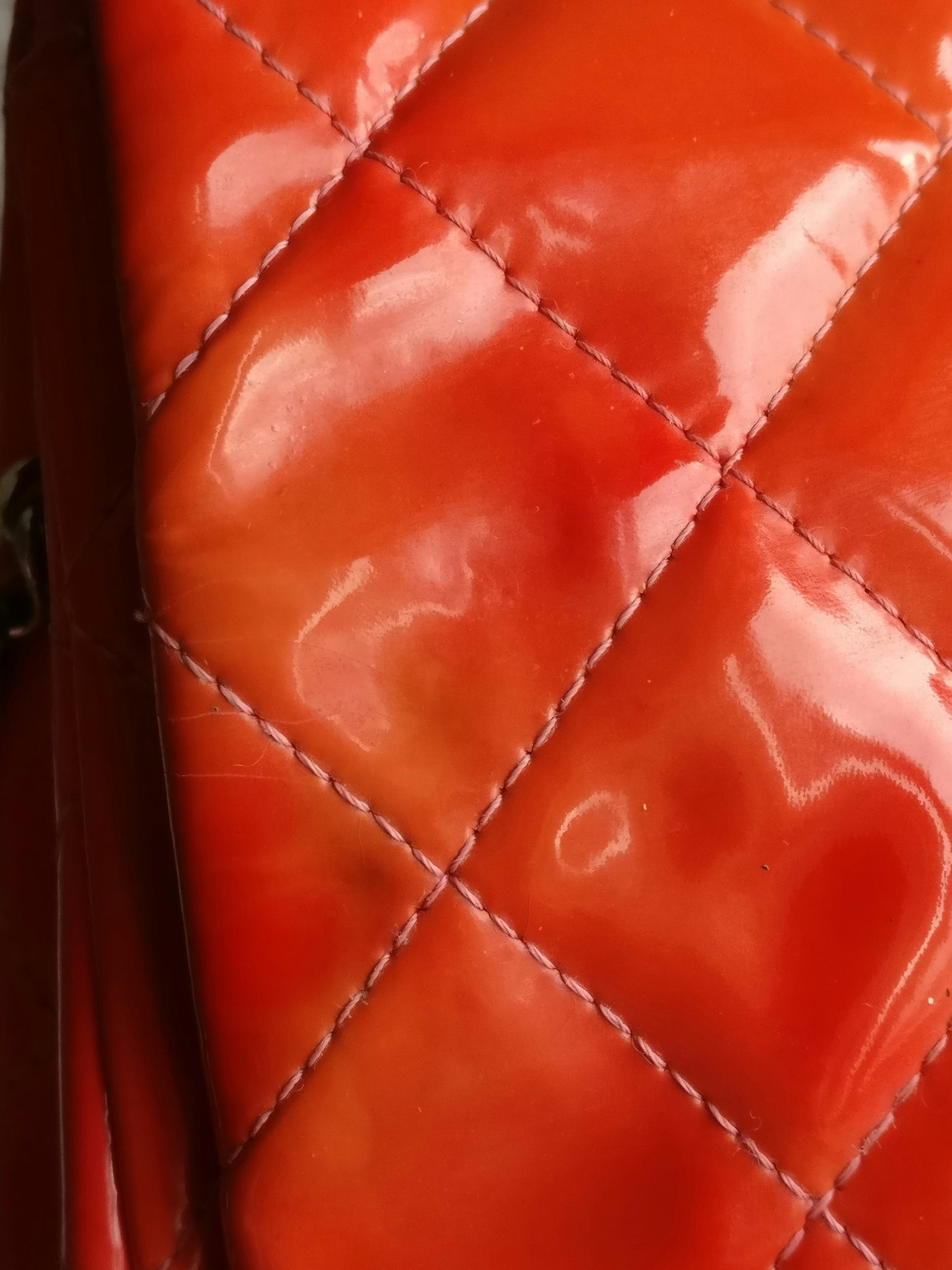 Chanel quilted red patent flap bag