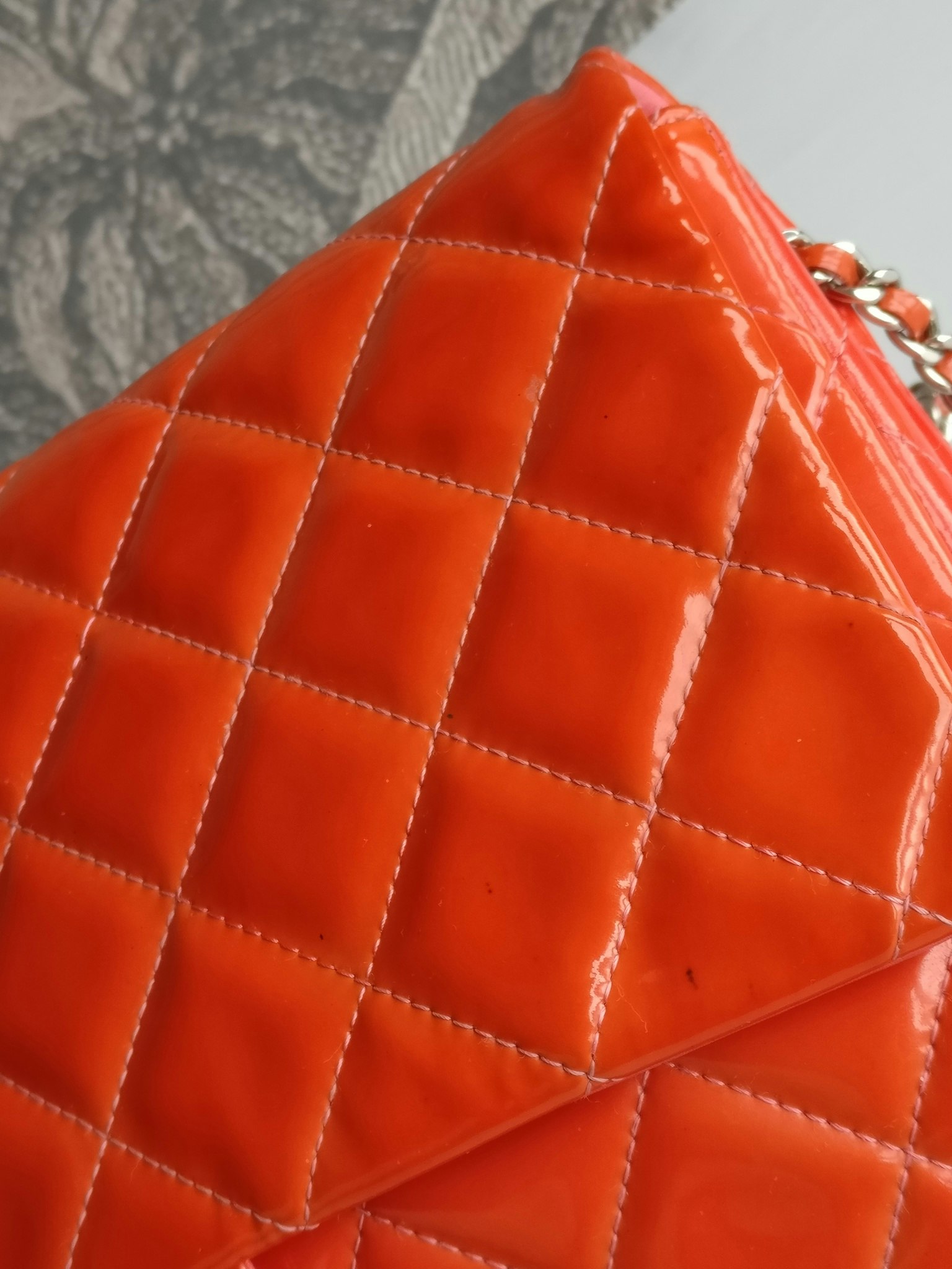Chanel quilted red patent flap bag