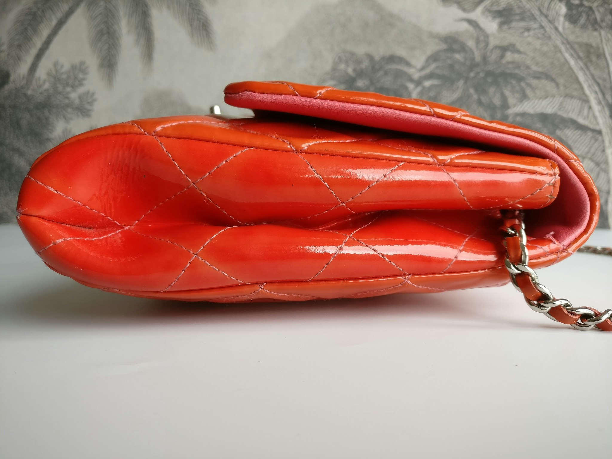 Chanel quilted red patent flap bag