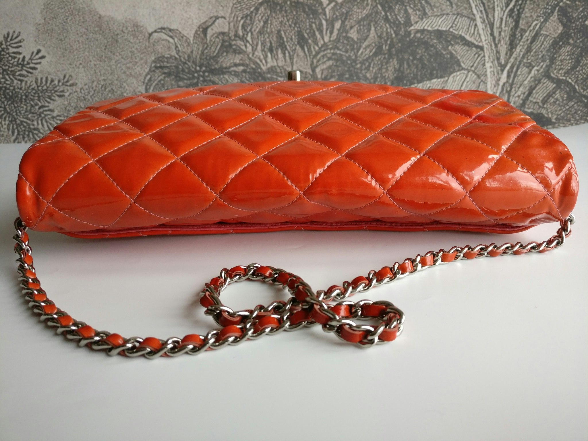 Chanel quilted red patent flap bag