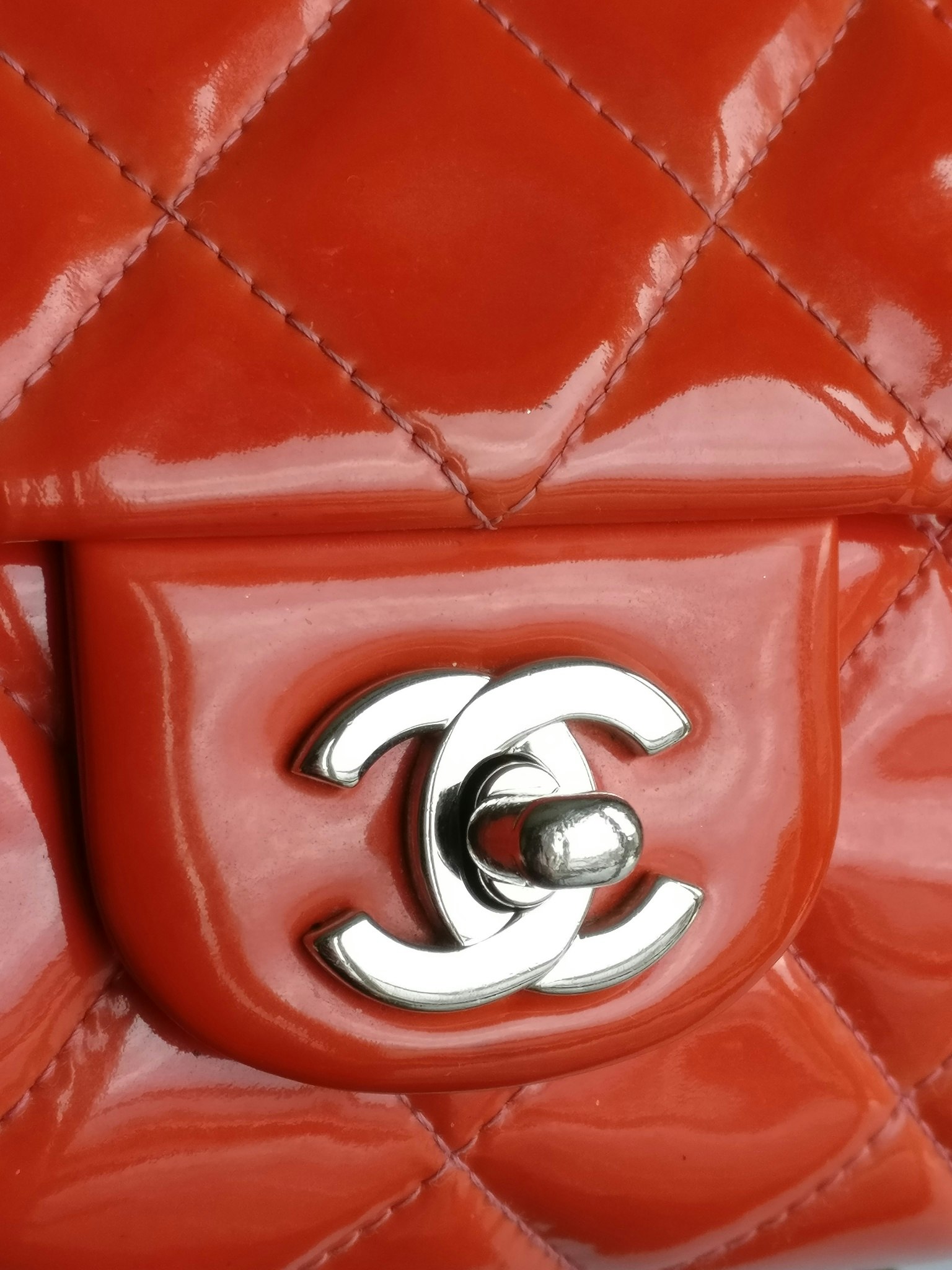 Chanel quilted red patent flap bag