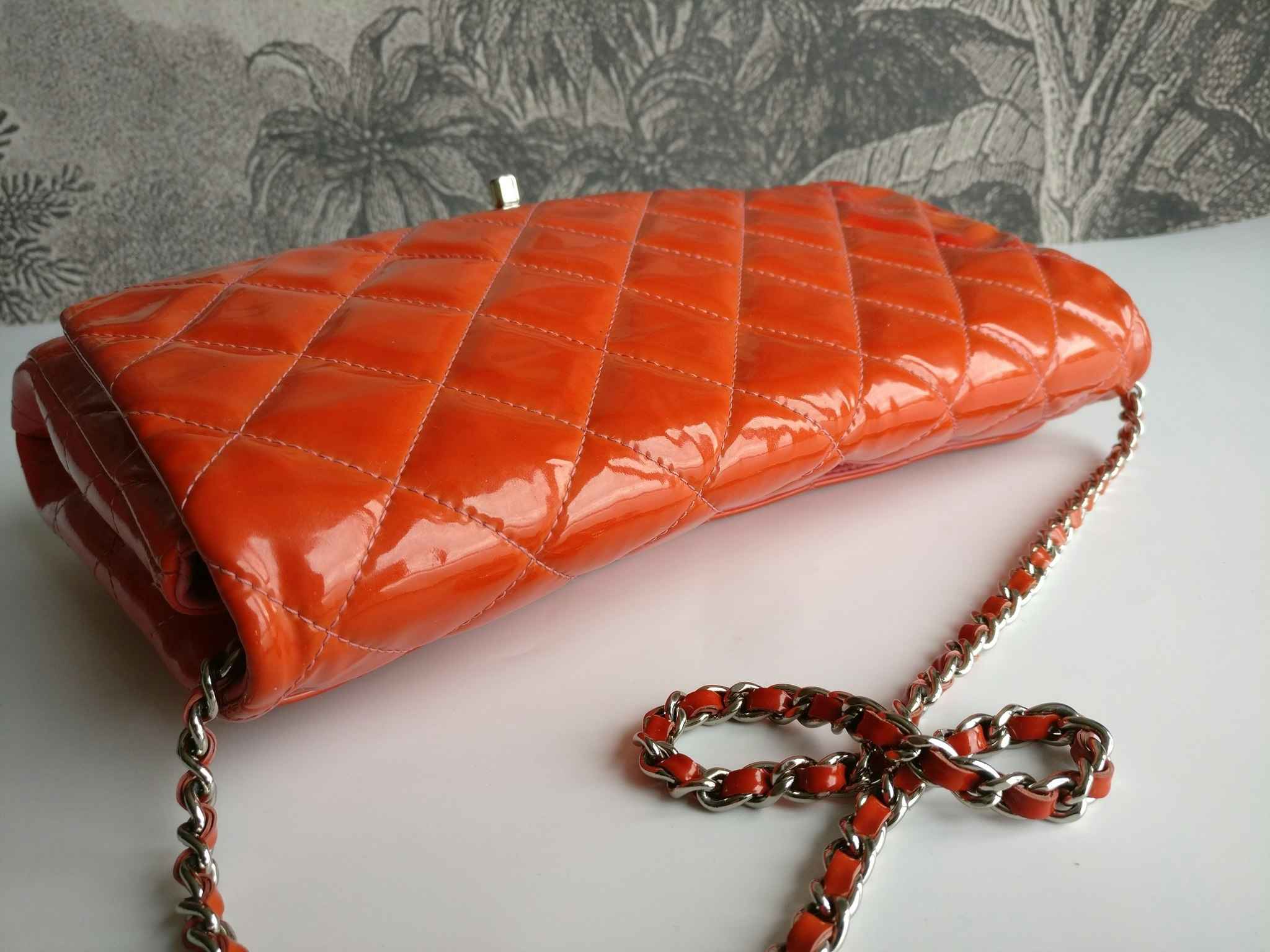Chanel quilted red patent flap bag