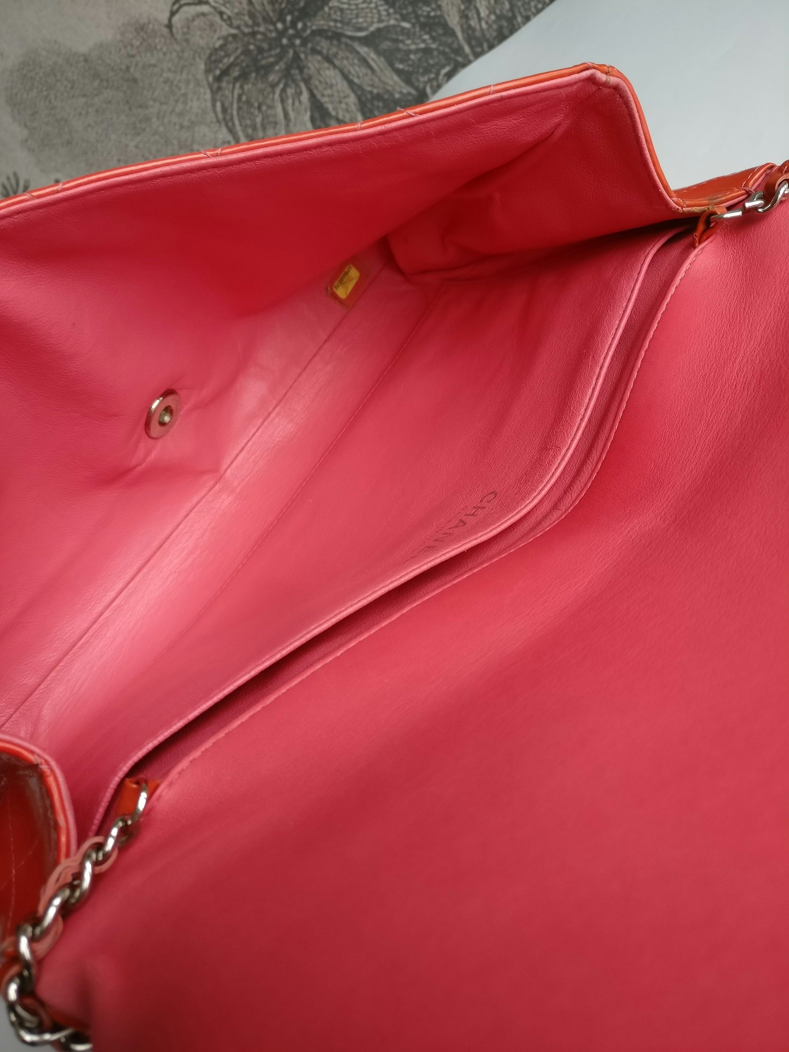 Chanel quilted red patent flap bag
