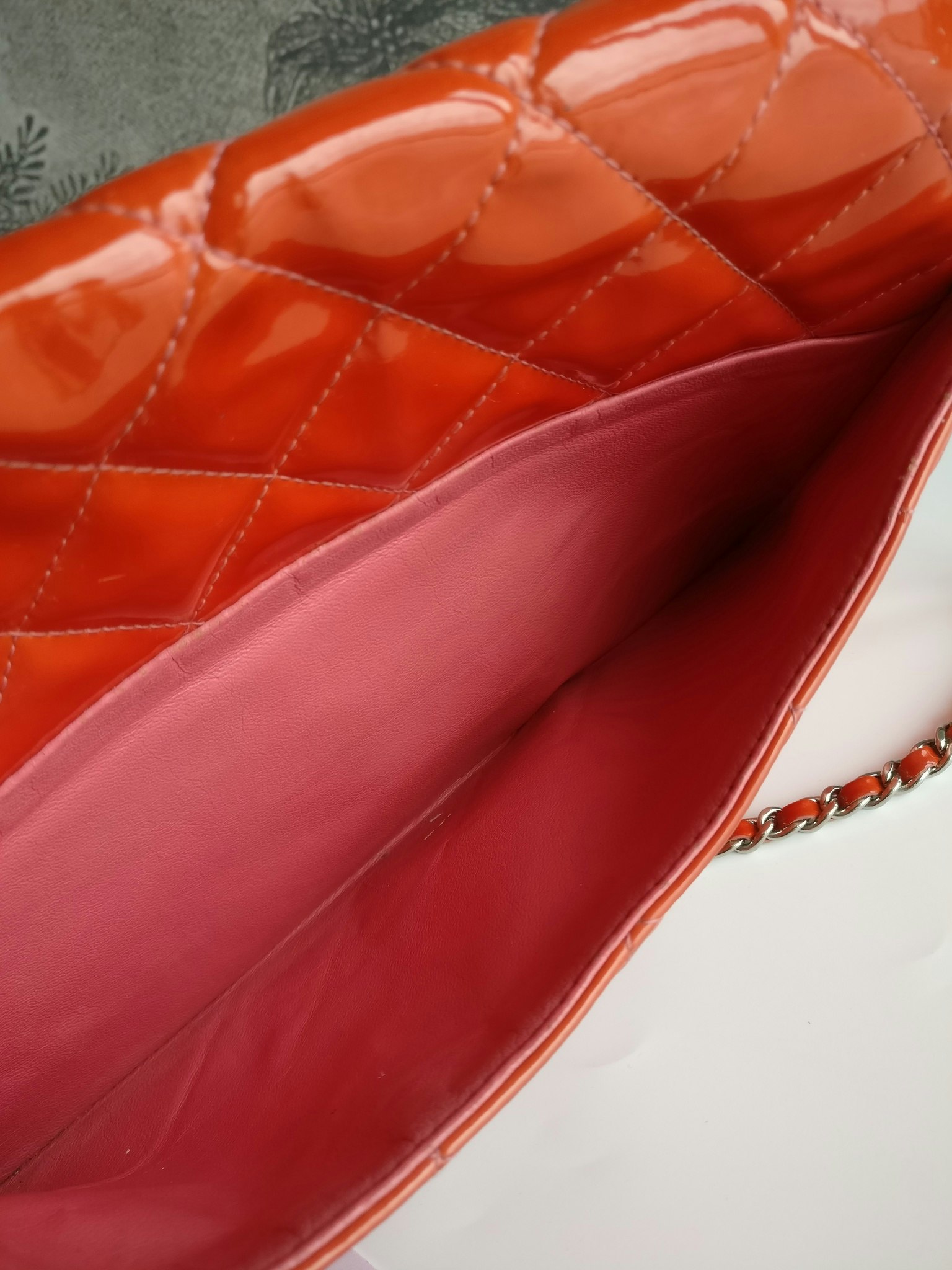 Chanel quilted red patent flap bag