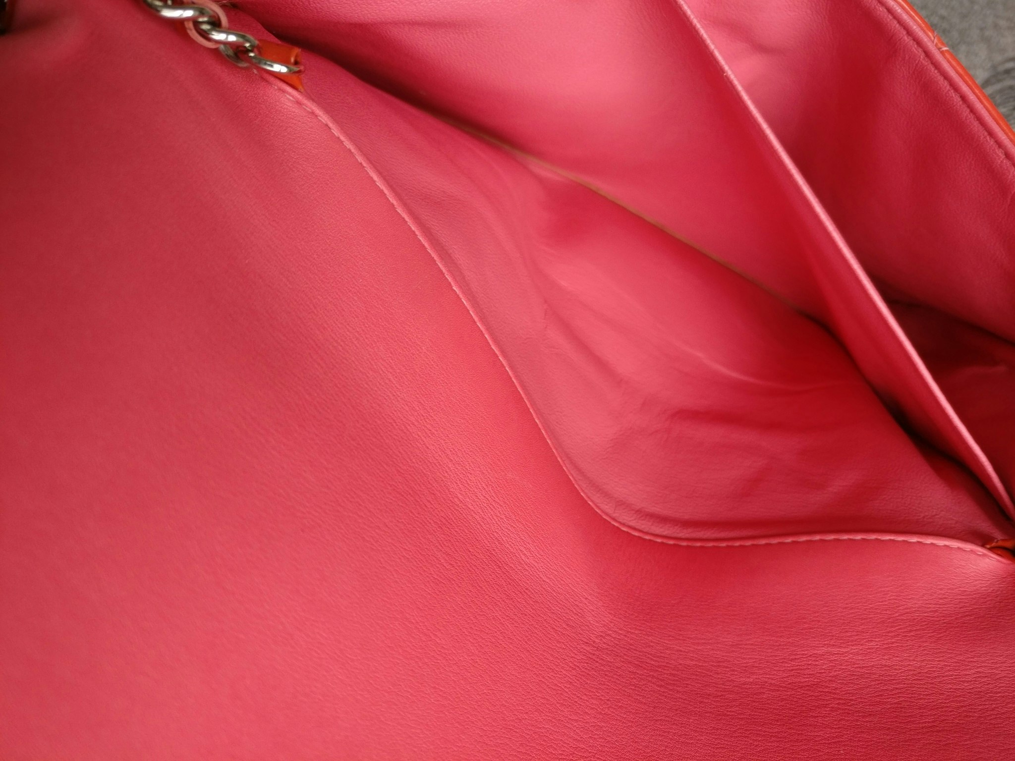 Chanel quilted red patent flap bag