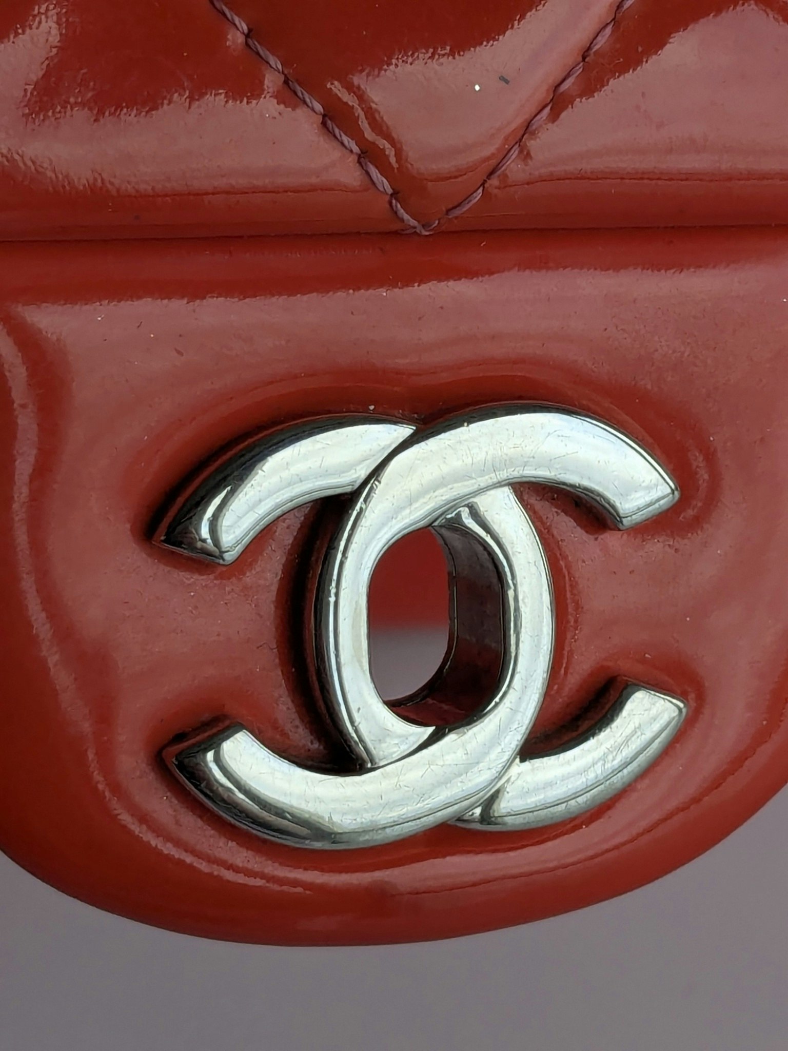 Chanel quilted red patent flap bag