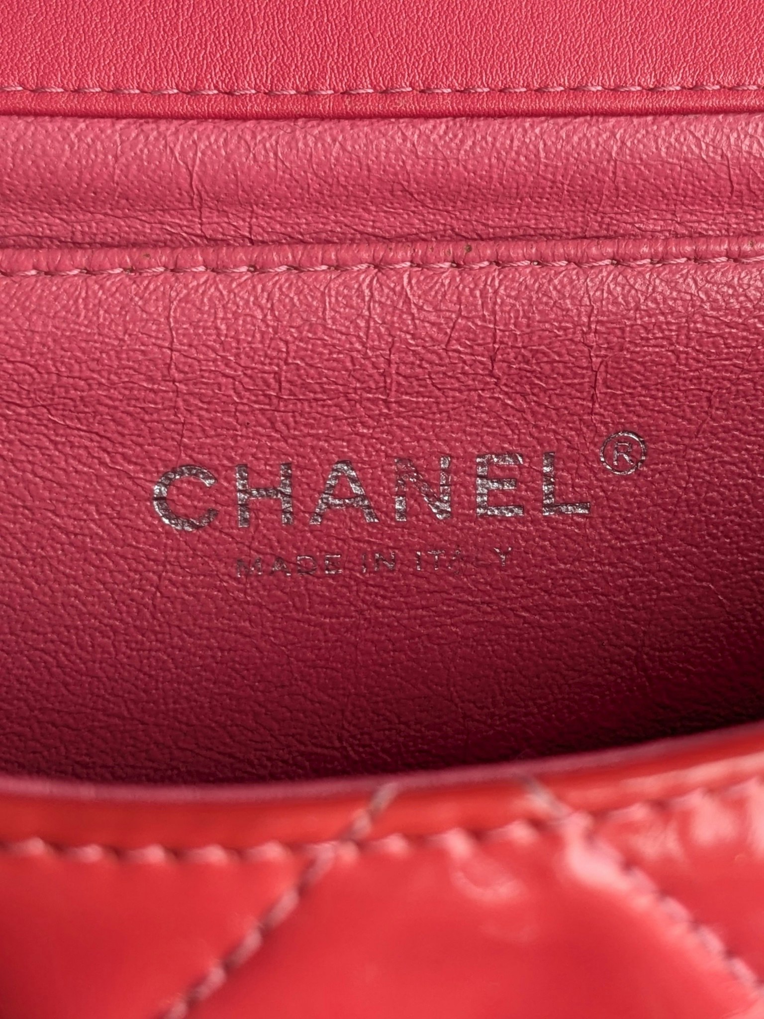 Chanel quilted red patent flap bag