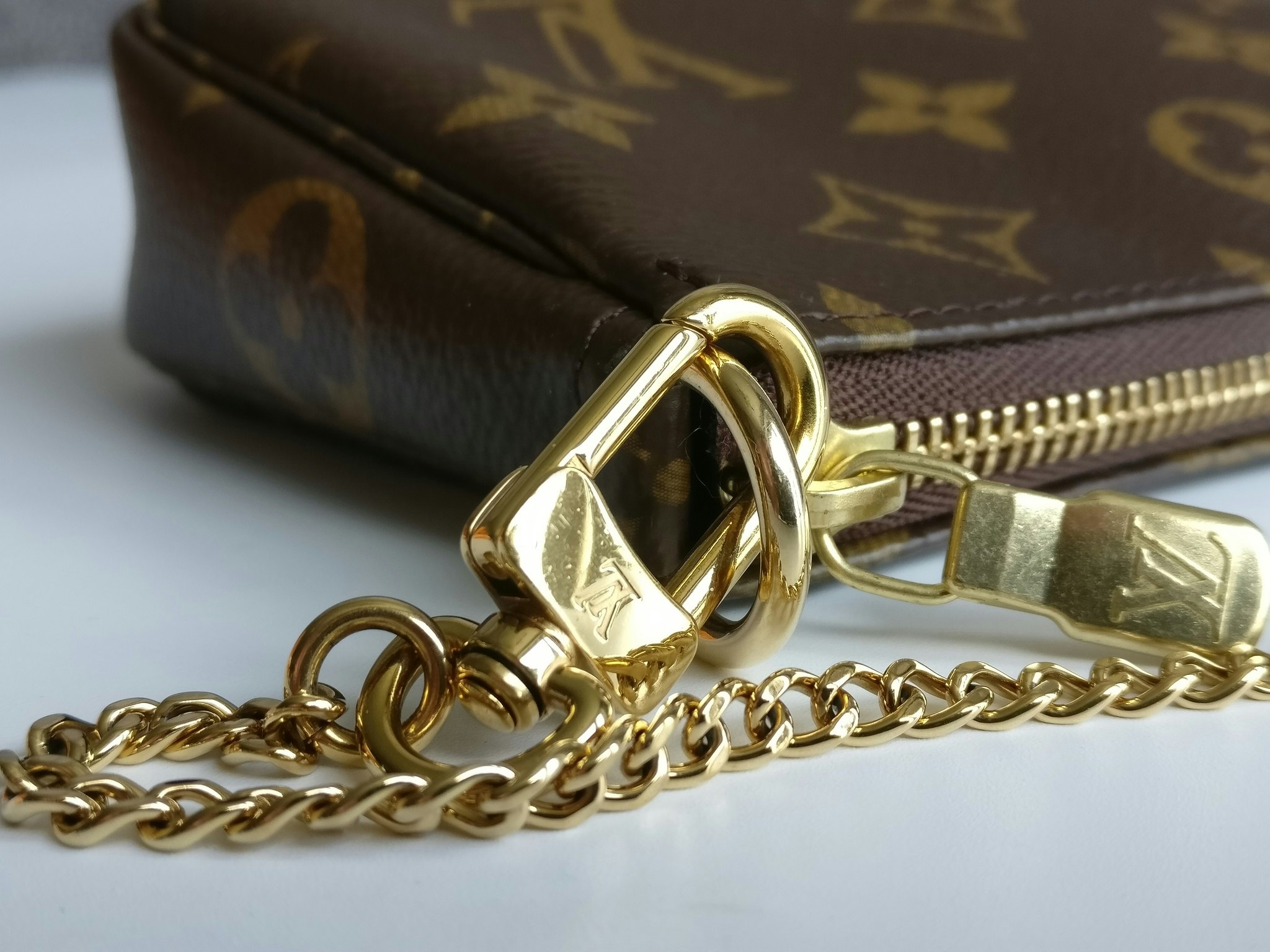 Louis Vuitton Mini Pochette Accessoires monogram