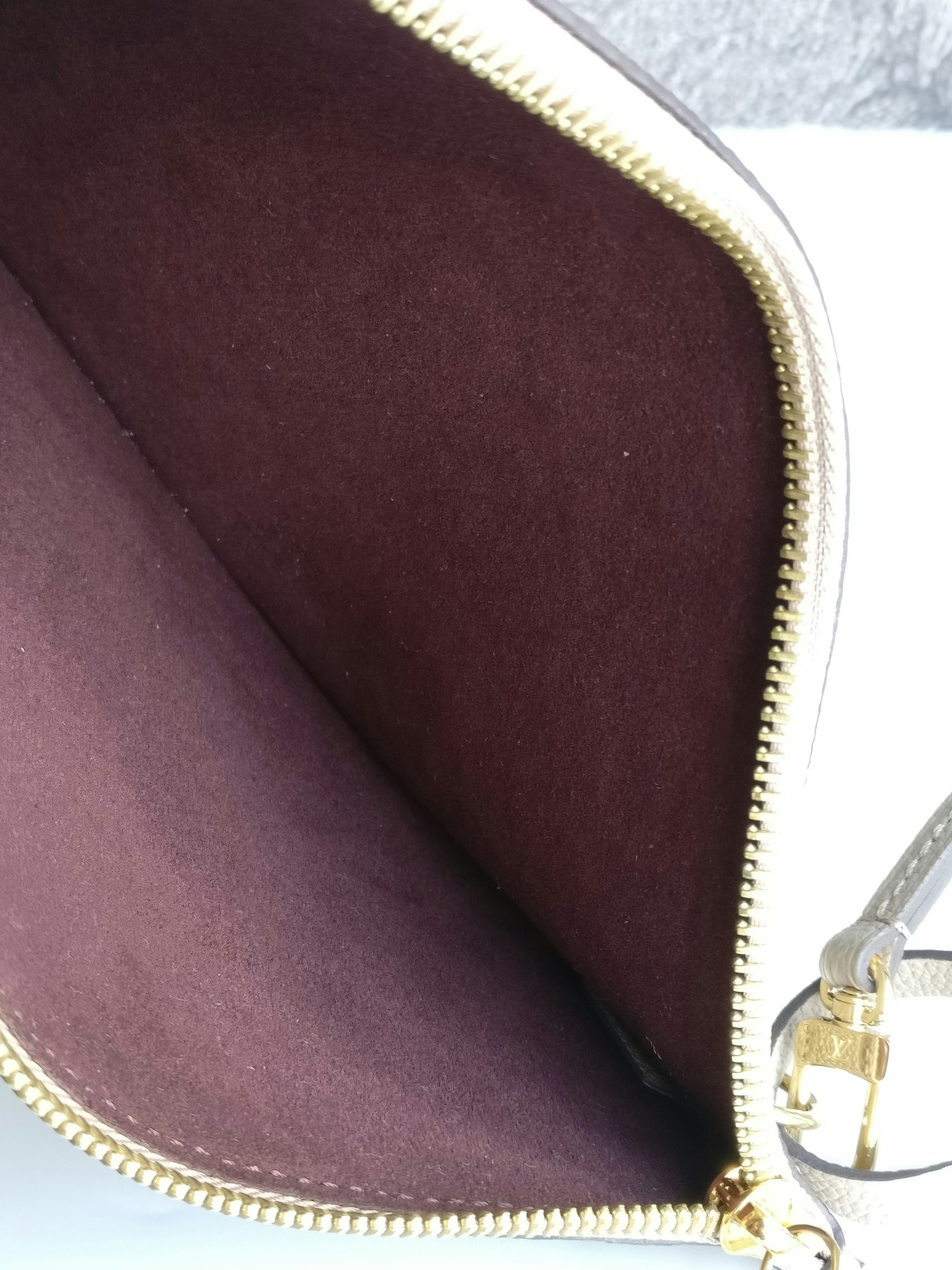 Louis Vuitton Neverfull pochette empreinte Dune