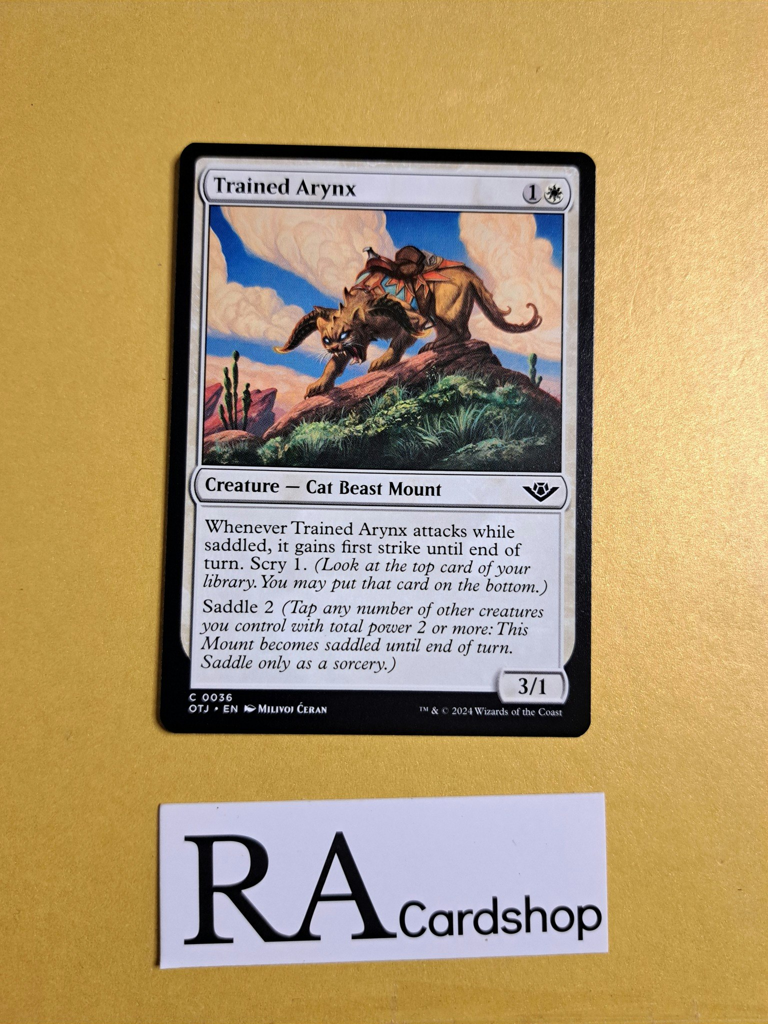 Trained Arynx Common 0036 Outlaws of Thunder Junction (OTJ) Magic the Gathering