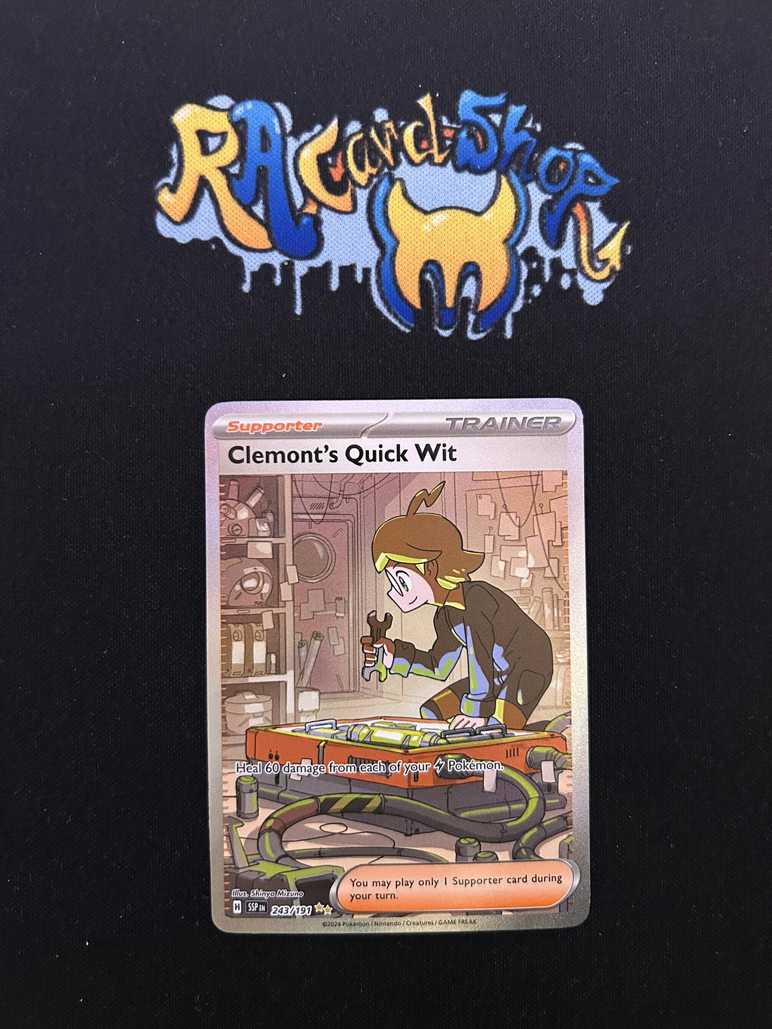 Clemonts Quick Wit Special Illustration Rare 243/191 Surging Sparks Pokemon
