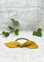 Senapsgul läderrosett-gummiband