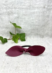 Plommonlila läderrosett-gummiband