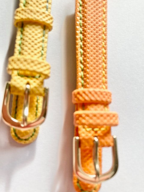 Barnklockarmband: Material textil och läder Färg Gul och orange guldplated stålspänne. hos Ericsson Ur och Guld