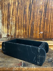 Tegelform svart