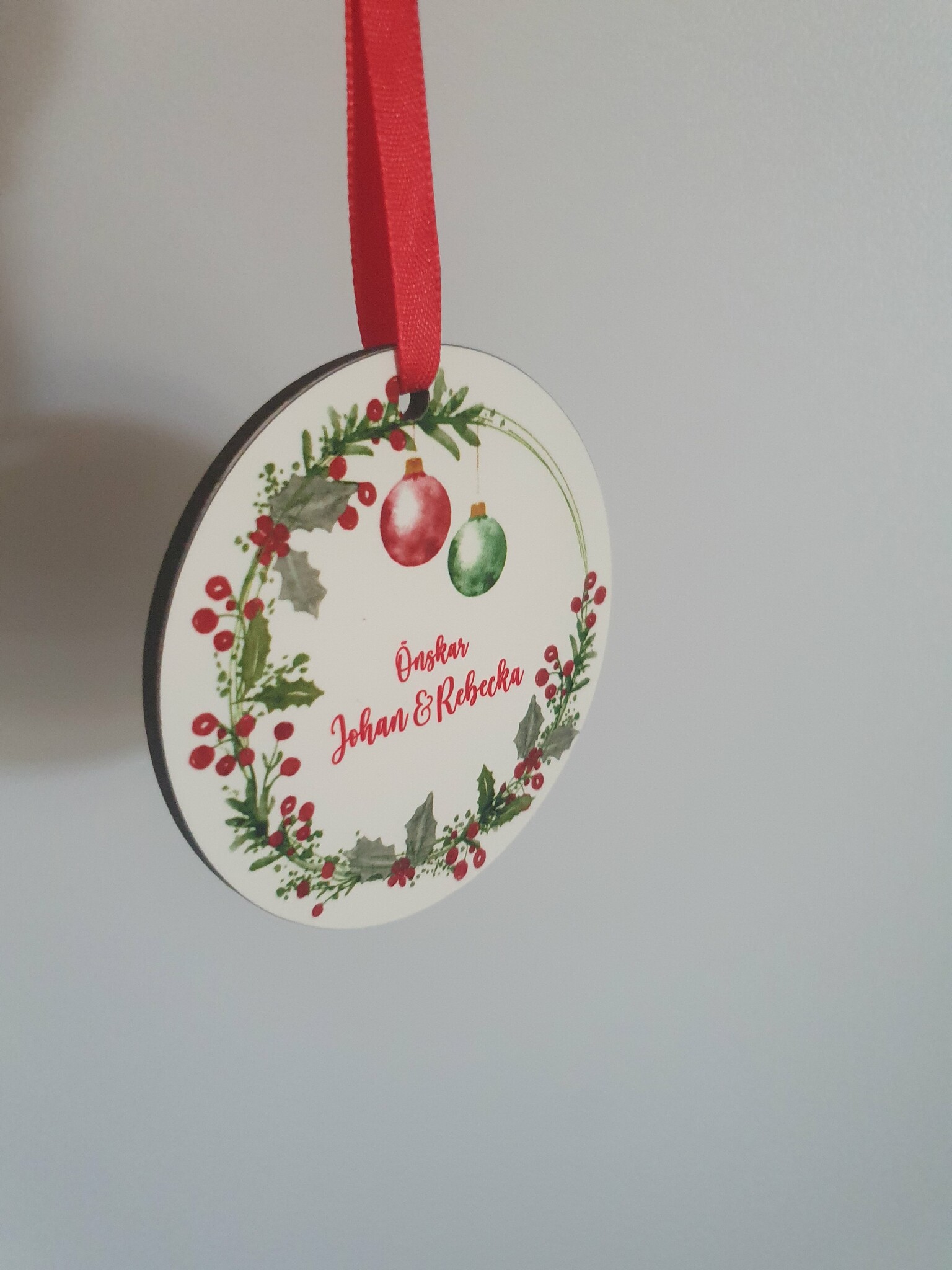 Foto julgranskula med God Jul och Krans på baksidan med önskar valfritt namn på baksida