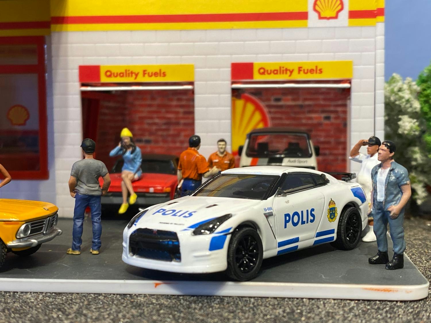 Skala 1/64 Nissan GT-R (R35) Svensk Polis Stockholm "Hot Pursuit" från Greenlight