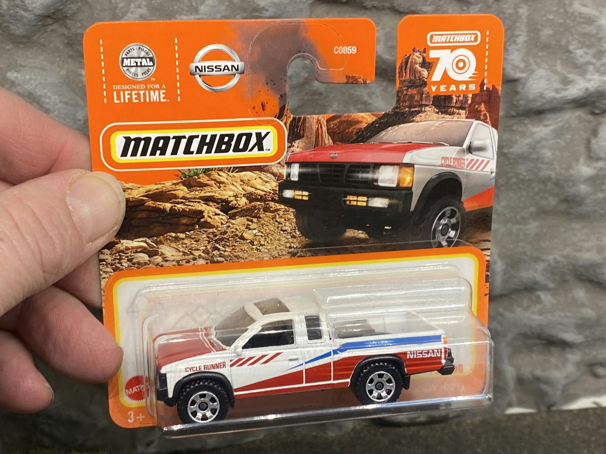 Skala 1/64 Matchbox - Nissan Hardbody (D21) 95' 70 år jubileum Matchbox