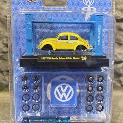 Skala 1/64 Fyrpelarlyft Volkswagen Beetle Deluxe USA model 67' fr M2