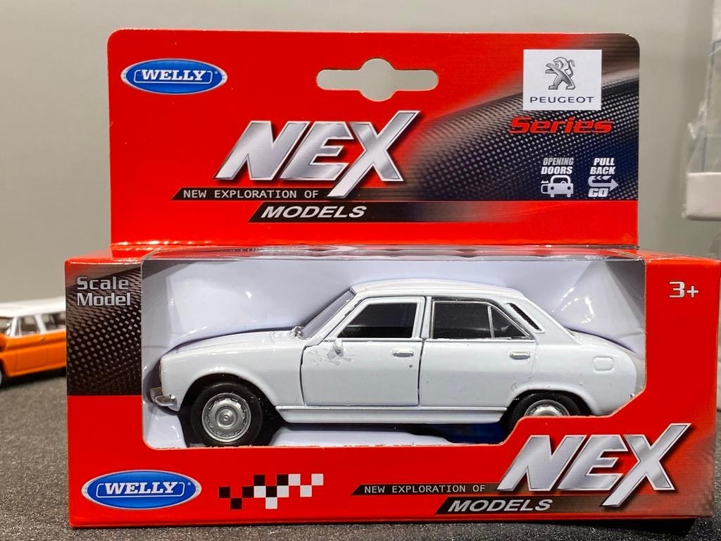 Skala 1/34 - 1/39  Peugeot 504 (1975) från Nex models / Welly