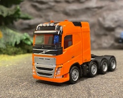 Skala 1/87 h0, Volvo FH GI. XL, orange från HERPA / Märkt m Swedish Truck Models