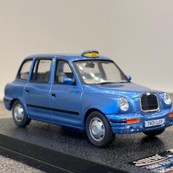 Skala 1/43 Nya TX1 London Taxi cab 1998 Blå från Vitesse