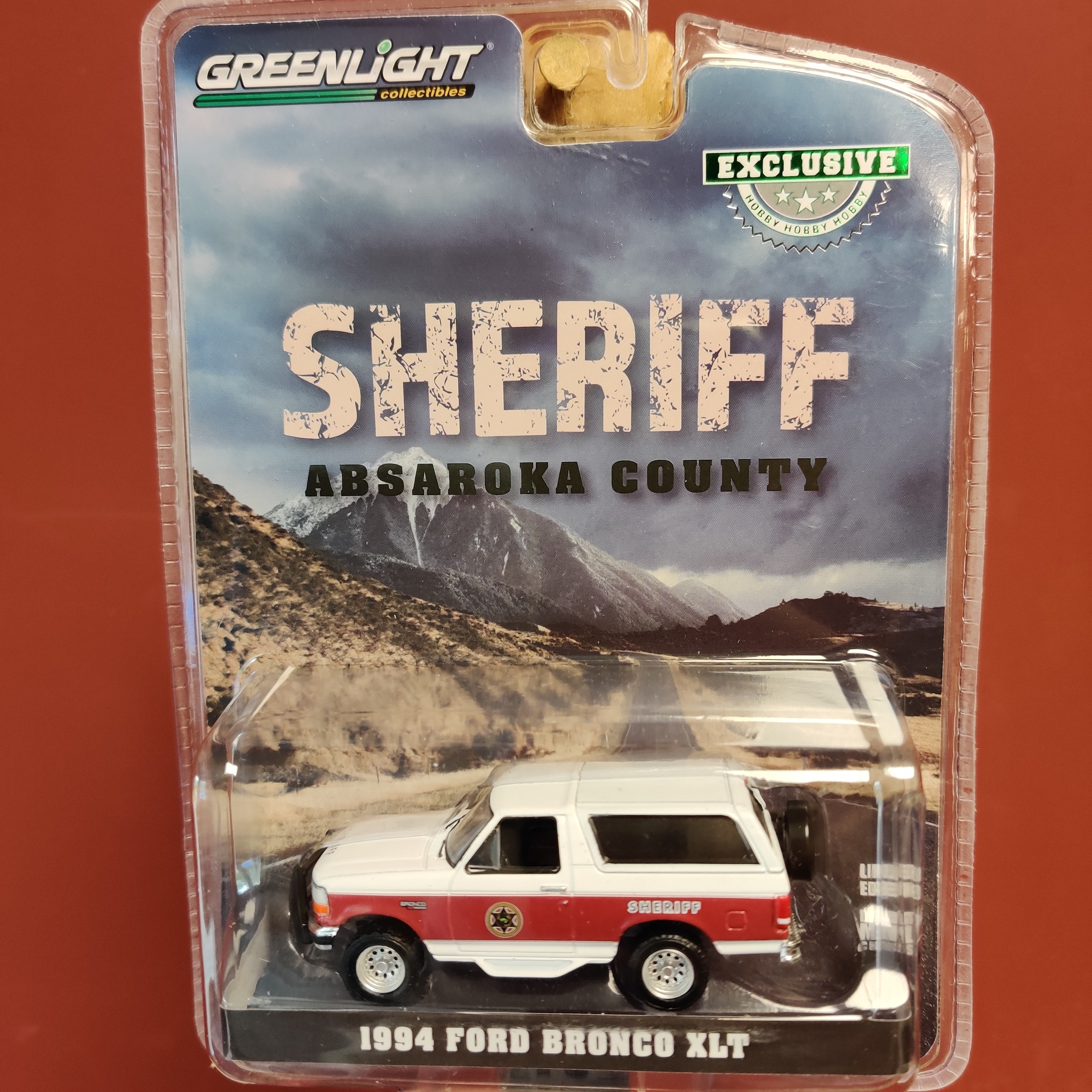 Skala 1/64 Ford Bronco XLT 94' "Sheriff Absaroka Country" från Greenlight