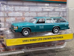Skala 1/64 Ford LTD Crown Victoria 91' TAXI fr Greenlight Excl. Lmt ed