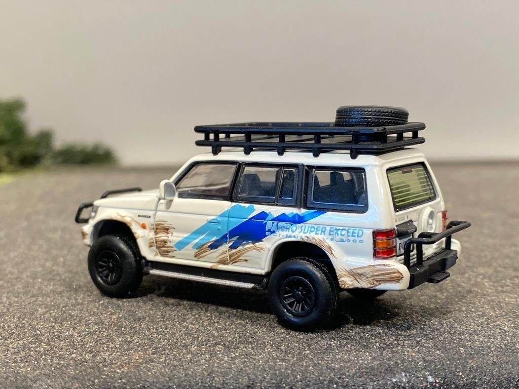 Skala 1/64 Mitsubishi Pajero 2gen, hö styrd - DM Diecast Masters BM Creations