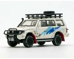 Skala 1/64 Mitsubishi Pajero 2gen, hö styrd - DM Diecast Masters BM Creations