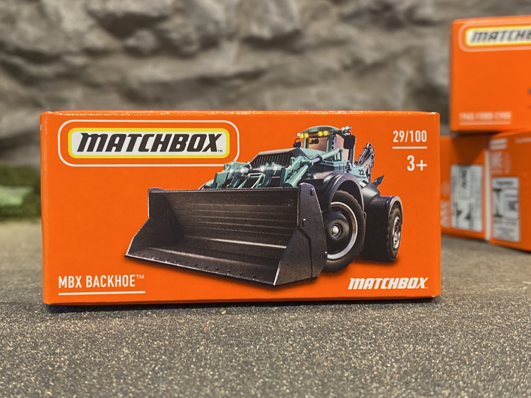Skala 1/64 Matchbox -  MBX Backhoe