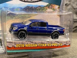 Skala 1/64 Nissan Titan XD Pro-4X 18' "All-Terrain" från Greenlight