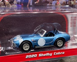 Skala 1/64 Shelby Cobra 20' Barrett Jackson auctions från Greenlight