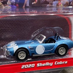 Skala 1/64 Shelby Cobra 20' Barrett Jackson auctions från Greenlight