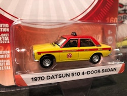 Skala 1/64 Datsun 510 4-door Sedan 70' (Taxi) "Tokyo Torque" från Greenlight