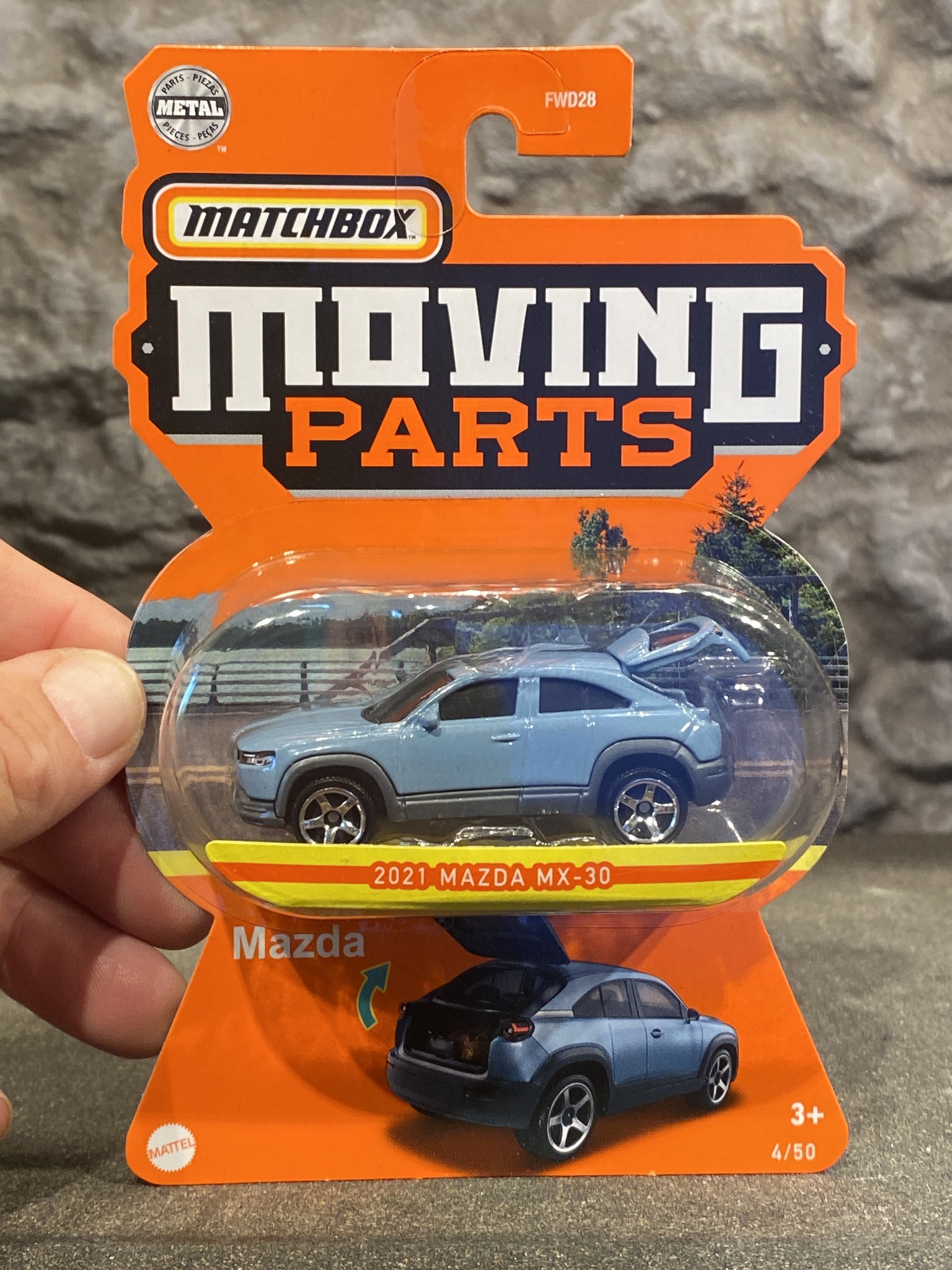 Skala 1/64 Mazda MX 30 2020' "Moving parts" från Matchbox