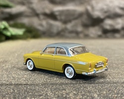 Skala 1/87 - Volvo Amazon , Mörkgul m grått tak från Brekina