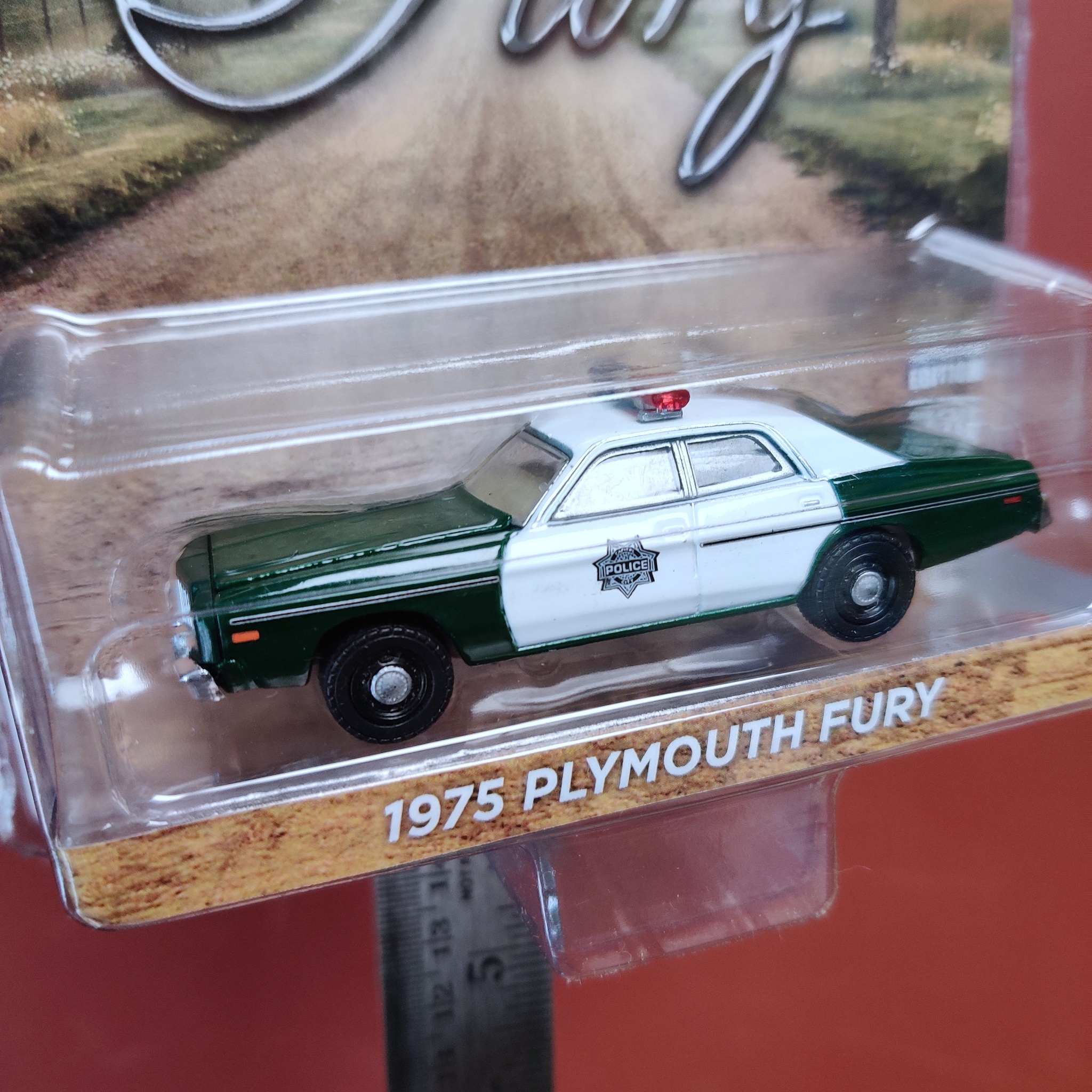 Skala 1/64 Plymouth FURY 75' "Capitol City Police" från Greenlight Excl.