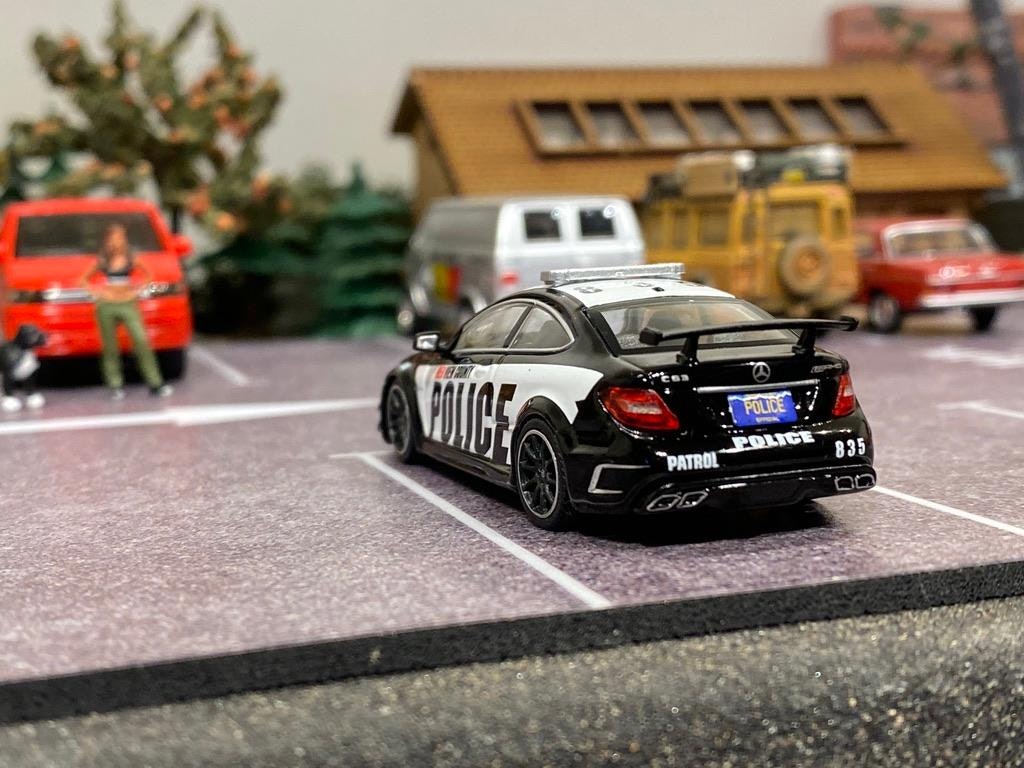 Skala 1/64 Exklusiv Mercedes-Benz C63 AMG Coupé POLICE f TARMAC works