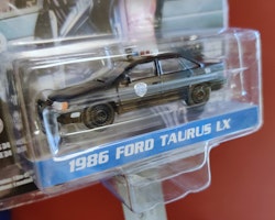 Skala 1/64 Ford Taurus LX Police 86' Robocop från Greenlight
