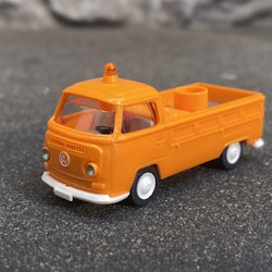 Skala 1/87 - Volkswagen T2 Folka Transporter, Orange m Grått flak från Wiking